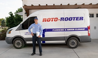 Emergency drain cleaning truck outside a Dallas home