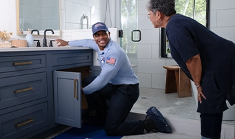 A Roto-Rooter emergency plumber in Dallas provides urgent service for a leaking bathroom sink drain