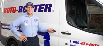 A Roto-Rooter technician arrives for an emergency repair of a garbage disposal in Dallas
