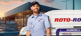 Van and technician pictured in front of Roto-Rooter location