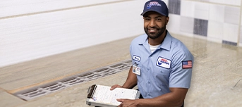 Roto-Rooter technician provides an estimate for drain cleaning in Portland