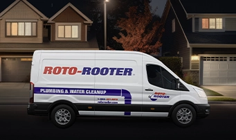 An emergency plumber in Portland arrives in a Roto-Rooter van