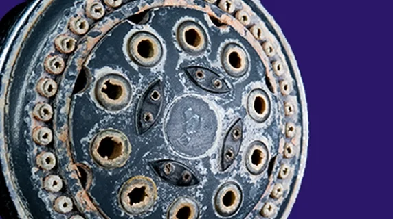 Hard water build up on a shower head.